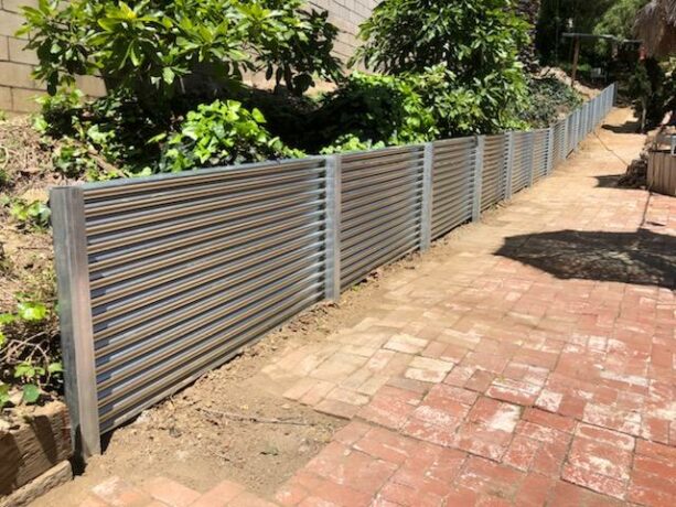 corrugated metal retaining wall with metal posts