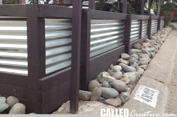 corrugated metal retaining wall with treated 4x4s and 2x4s