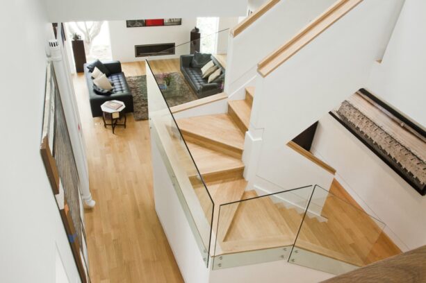 frameless glass half wall stair for a landing