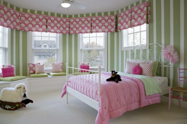 green striped walls with bold pink window treatment