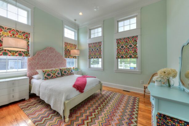 incorporating a lot of patterns in a pink and green bedroom