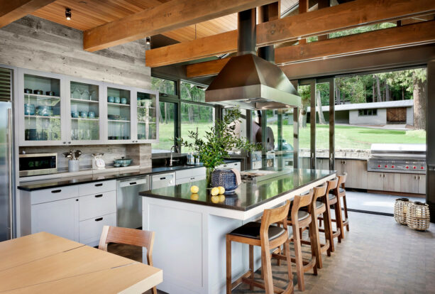 mountain style galley kitchen with a touch of a modern vibe and a breakfast bar