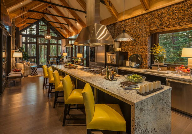 open floor galley kitchen with a long breakfast bar